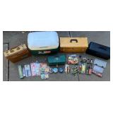 Vintage Fishing Tackle Box Collection with Reels, Lures, Cooler, and Accessories