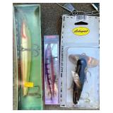 Vintage Fishing Tackle Box Collection with Reels, Lures, Cooler, and Accessories