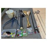 Large Fishing and Boating Gear Lot with Rods, Lures, Paddles, and Accessories