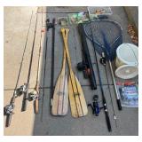 Large Fishing and Boating Gear Lot with Rods, Lures, Paddles, and Accessories