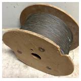 Large Spool of Metal Wire on Wooden Reel