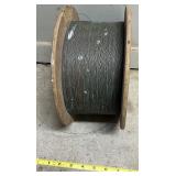 Large Spool of Metal Wire on Wooden Reel