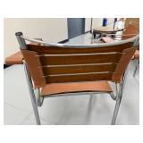 Pair of Mid-Century Modern Chrome and Leather Arm Chairs
