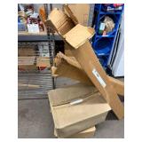 Assortment of Bronze Weatherstrips and Concentric Pipe Adaptors in Damaged Packaging
