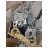 Large Lot of Plumbing Parts and Supplies with Vacuum Breakers, Putty, and Fittings