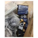 Large Lot of Plumbing Parts and Supplies with Vacuum Breakers, Putty, and Fittings