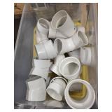 Collection of PVC Plumbing Fittings in Storage Tote