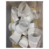 Collection of PVC Plumbing Fittings in Storage Tote