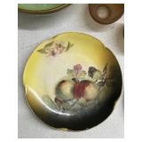 Collection of 7 Vintage Porcelain Plates and Bowls with Floral and Cat Designs