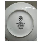 Collection of 7 Vintage Porcelain Plates and Bowls with Floral and Cat Designs