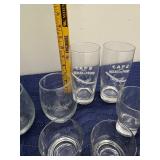 Collection of Assorted Glassware Including Tumblers, Mugs, and Stamped Bar Glasses