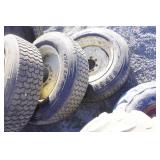 Set of 4 - Firestone T575 LP Radial Bobcat Snow Tires on 8 Bolt Rims