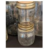 LR - Collection of 17 Vintage Glass Jars and Bottles Assorted Styles with Lids