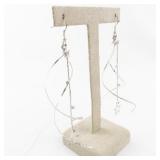 Pair of Silver Spiral Dangle Earrings with Star Accents