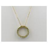 Gold Tone Necklace with Green Gemstone Circle Wreath Pendant