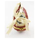 Red Porcelain Musical Egg Ornament with Holly and Bell Design