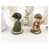 Collection of 8 Angel Figurines Assorted Materials and Finishes