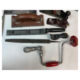 Collection of Vintage Woodworking Hand Tools Including Planes, Saws, and Files