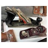 Collection of Vintage Woodworking Hand Tools Including Planes, Saws, and Files