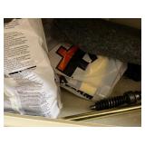 Cabinet of Mixed Industrial Parts Including Oil Filters, Pistons, Bearings, and Hardware