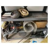 Workshop Equipment and Material Collection with Hand Tools, Shelving, Metal Sheets, and Clamps
