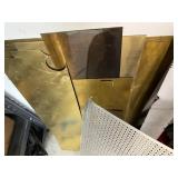 Workshop Equipment and Material Collection with Hand Tools, Shelving, Metal Sheets, and Clamps
