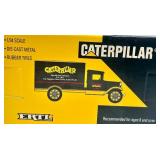 Caterpillar 1931 Hawkeye Die-Cast Truck Bank and Wooden Sign