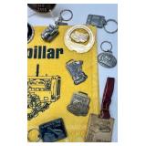 Caterpillar Collectibles Lot: Wall Clock, Mugs, Keychains, Medallions, and Memorabilia