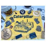 Caterpillar Collectibles Lot: Wall Clock, Mugs, Keychains, Medallions, and Memorabilia