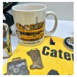 Caterpillar Collectibles Lot: Wall Clock, Mugs, Keychains, Medallions, and Memorabilia