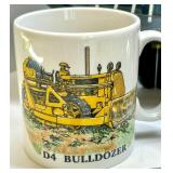 Caterpillar Collectibles Lot: Wall Clock, Mugs, Keychains, Medallions, and Memorabilia