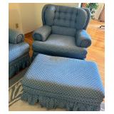 Blue Upholstered Sofa, Chair, and Ottoman Set with Skirted Detailing and Area rug
