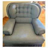 Blue Upholstered Sofa, Chair, and Ottoman Set with Skirted Detailing and Area rug