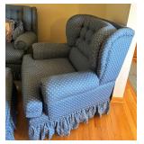 Blue Upholstered Sofa, Chair, and Ottoman Set with Skirted Detailing and Area rug