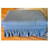 Blue Upholstered Sofa, Chair, and Ottoman Set with Skirted Detailing and Area rug
