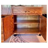 Rolling Oak Storage Cabinet with Drawer and Shelves