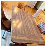 Dining Table with Wood Grain Finish and 4 Rolling Chairs