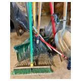 Collection of Garden and Lawn Tools including Shovels, Rake, Brooms, and Pruner