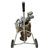 Vintage Golf Bag on a Pull Cart with Golf Clubs and Covers
