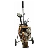 Vintage Golf Bag on a Pull Cart with Golf Clubs and Covers
