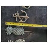 2 sets of Heavy Never hung Pineapple and Anchor Coat hangers