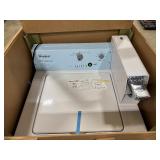 New in Box Whirlpool Coin Operated Washing Machine (CAE2745FQ1) White.  Box opened for pictures.