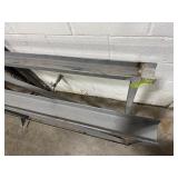 Two Metal Safety Rails.  22 Feet Long x 3" Wide x 42" High