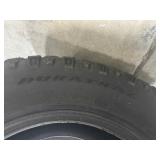 Two Goodyear Tires - Goodyear Wrangler Duratrack Tire 265-70-R17. Goodyear Ultra Terrain AT Tire 265-70-R17.