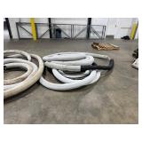 Two Sections of 4 1/2" Diameter Drain Hose. Each Section ~ 100 feet.