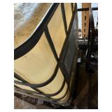 Used oil container and two barrels