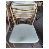 Eight Folding Chairs