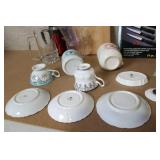 Mixed Kitchenware Collection with Vintage Teacups, Measuring Cups, Knives, Mugs, and Glassware