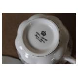 Mixed Kitchenware Collection with Vintage Teacups, Measuring Cups, Knives, Mugs, and Glassware