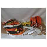 Large Assortment of Extension Cords, Reel Reels, Power Strips and Landscape Cable